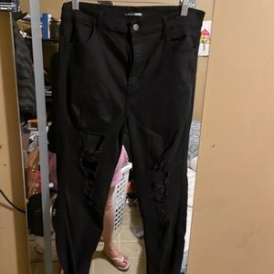 Fashion Nova black destructed skinny jeans